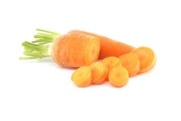 Whole carrot and its sliced pieces isolated against a white background