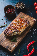Grilled steak on a serving board