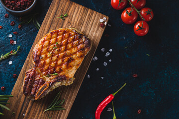Grilled steak on a serving board