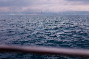 view of Haifa port and the city from a ship at sea.  Container terminal. Haifa. Israel.