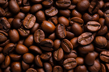 Obraz premium Pile of coffee beans with lot of coffee beans.