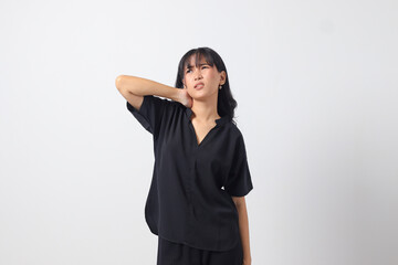 Portrait of unhealthy Asian woman in casual shirt touching her neck and feeling exhausted after work. Businesswoman concept. Isolated image on white background