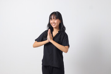 Portrait of attractive Asian woman in casual shirt showing apologize and welcome hand gesture. Businesswoman concept. Isolated image on white background