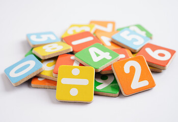 Naklejka premium Number wood block cubes for learning Mathematic, education math concept.