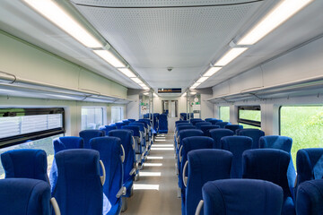 Fototapeta premium View of an empty passenger train car from above. Selected focus.