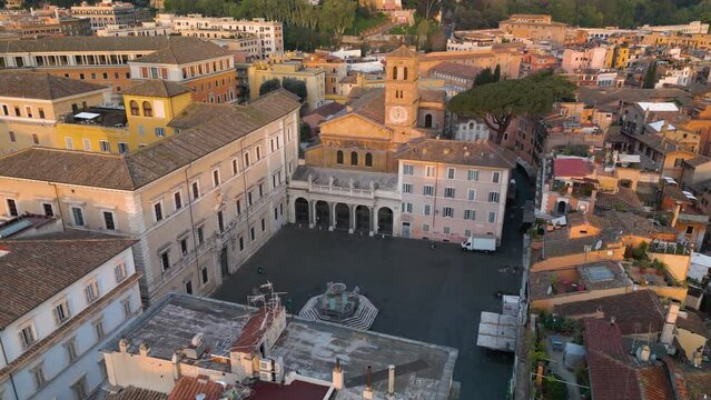 Beautiful Establishing Drone Shot Above Piazza di Santa Maria in Trastevere. Rome, Italy.