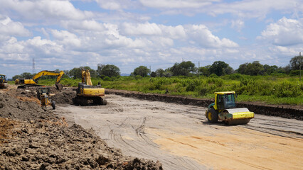 excavator and roller machine