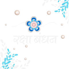 Floral rakhi with hindi text Raksha Bandhan on sea green background decorated by leaves and pearls.