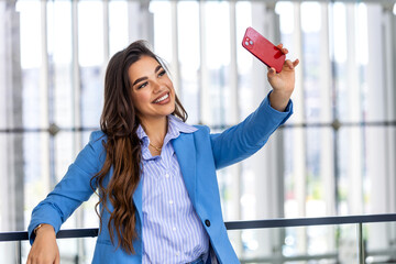 Business woman waving hand using smartphone app enjoying online virtual chat video call with...