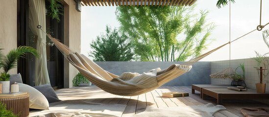 Terrace snug hammock and blanket with lush houseplant during sunset