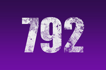 flat white grunge number of 792 on purple background.