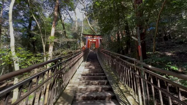 Stairs leading up to the gates of Fushimi Inari Taisha in Kyoto Japan.