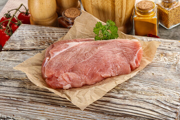 Raw pork schnitzel for cooking