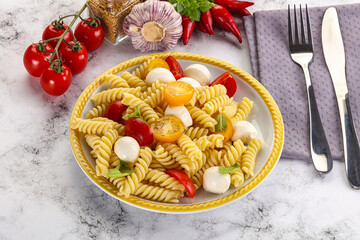 Italian pasta with mozzarella and tomato