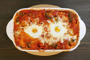 Closeup of Delectable Shakshouka, a Dish of Poached Eggs in Flavorful Tomato Sauce