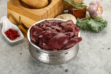 Raw uncooked chicken liver in the bowl