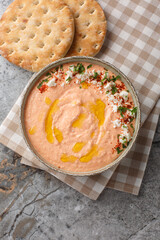 Tirokafteri Spicy Feta Dip spicy, creamy, tangy mezze from northern Greece closeup on the bowl on...