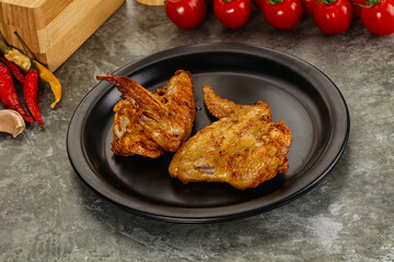 Tasty roasted chicken wing with spices