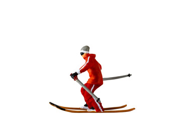 Miniature people , A skier full length Isolated with clipping path