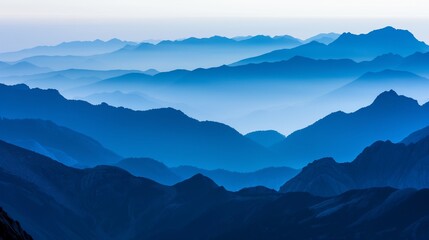 A panoramic view of multiple mountain peaks, each layered behind the other, creating a mesmerizing gradient of blue tones at dusk. 32k, full ultra hd, high resolution