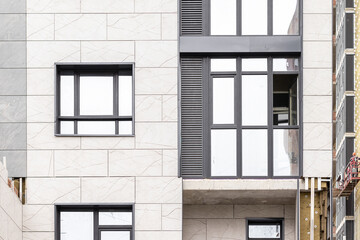 Facade of a building under construction in the city