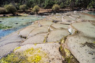 The man made cascading pools at the foothill of Jade Dragon Snow Mountain in Yulong Naxi Autonomous...