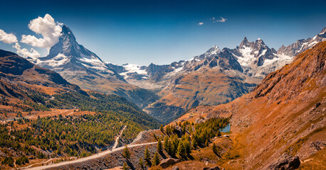 Majestic autumn view of Matterhorn peak. Unbelievable morning scene of Swiss Alps, Zermatt...