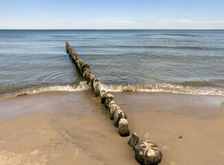 Groyne on the beach on the Polish Baltic Sea coast