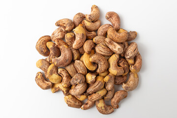 Shelled cashew nuts on white background