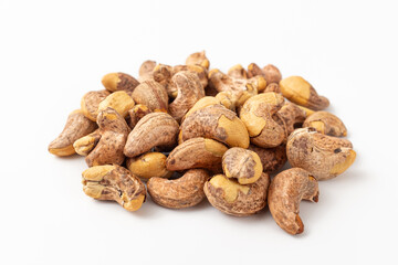 Shelled cashew nuts on white background