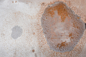 Old rusty surfaces also deteriorate with age.