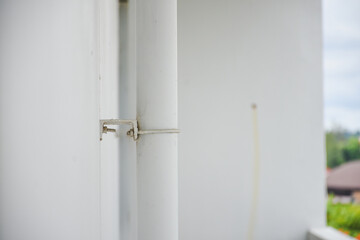 Close-up of a white drainpipe