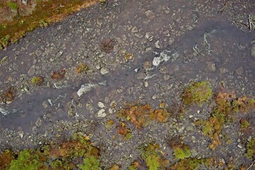 Aerial view of flowing rapids in cloudy weather, Ovre Pasvik National Park, Norway.
