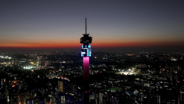 Hillbrow Tower At Johannesburg In Gauteng South Africa. Sunset City Landscape. Illuminated Tower. Johannesburg At Gauteng South Africa. Landmark Buildings. Colorful Sunset Skyline.