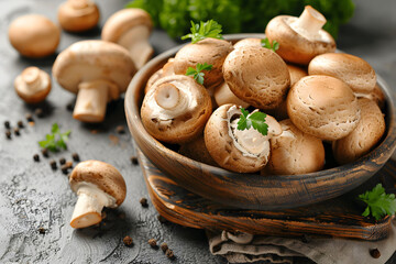 Fototapeta premium A bowl of mushrooms and parsley on a table