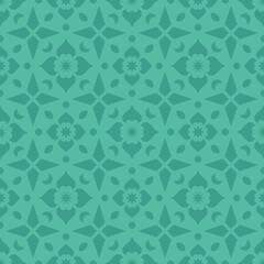 Green seamless pattern with green abstract flowers