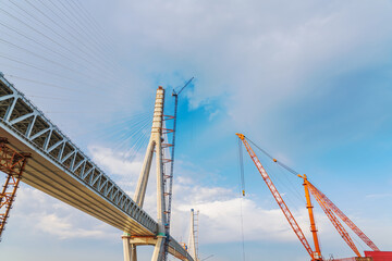 The Changtai Yangtze River Bridge under construction in Jiangsu Province, China