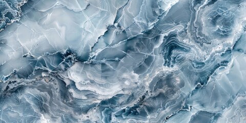 Obraz premium A closeup of an icy landscape, showcasing the intricate patterns and textures in shades of blue gray marble, evoking coolness and freshness