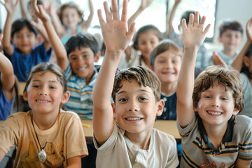 Group of pupils at school with their hands raised and the classroom in the background. Back to school. Children students raising their hands at lesson and having fun in class to answer the question.
