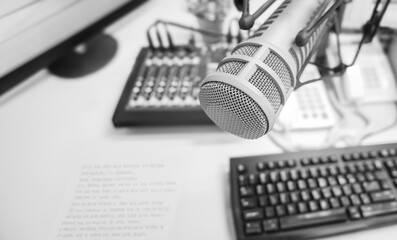 Professional microphone and sound mixer in radio station studio