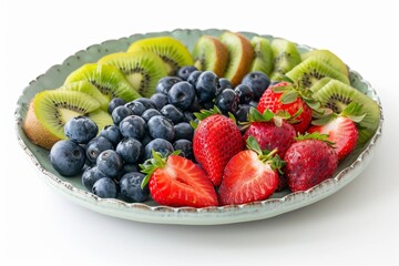 Plate of ripe, colorful fruits including strawberries, blueberries, and kiwi