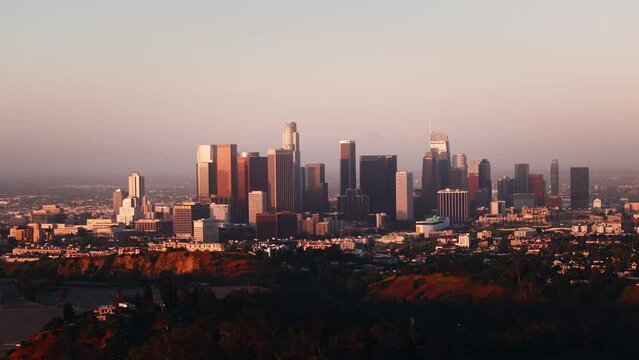 Scenic aerial view of skyscrapers and high rise buildings in Downtown Los Angeles California USA during sunrise