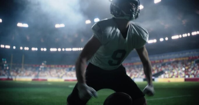 Caucasian American Football Player Jumping on Grass and Scoring a Touchdown Goal in Tournament Match, Celebrating Victory on Field. Male Athlete Excited and Crowd is Cheering