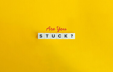 Are You Stuck Banner. Concept of Being in Difficult Situation. Block Letter Tiles on Flat Background. Minimalist Aesthetics.