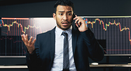 Phone call, business man and computer with stock market update for financial investment, research...