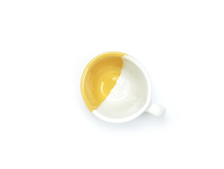 Empty yellow-white mug isolated on white background. Use for home or restaurant, food design....