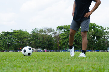 Football players get fit before kicking the ball.