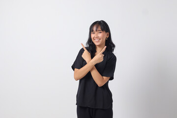 Portrait of excited Asian woman in casual shirt spreading hands making choice, choosing between two objects. Businesswoman concept. Isolated image on white background