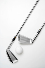 Closeup view of the golf club with the ball