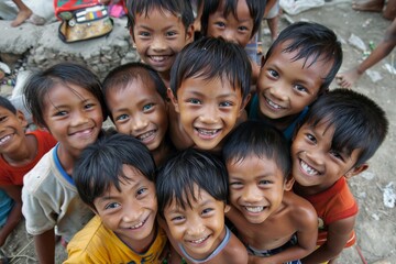 Group of asian children smiling and looking at camera in the Philippines